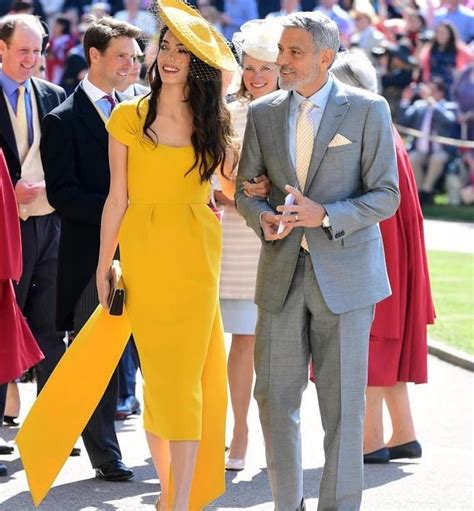 Amal Alamuddin in giallo al matrimonio di Meghan Markle
