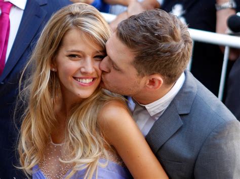 Luisana Lopilato e Michael Bublé in abiti da sposa
