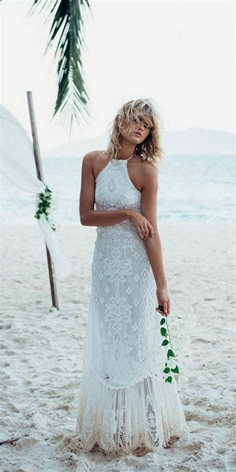 esempi di abiti da sposa e sposo per matrimonio in spiaggia