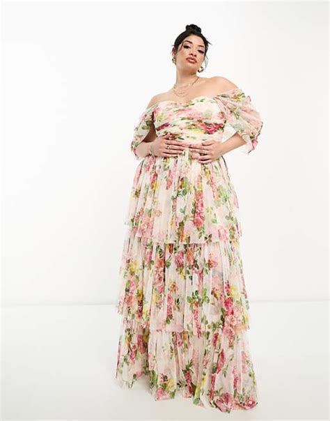 Vestito lungo rosa a fiori con spalle scoperte e dettagli drappeggiati