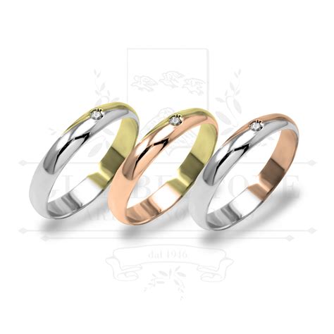 Anelli di fidanzamento e fedi nuziali in oro bianco