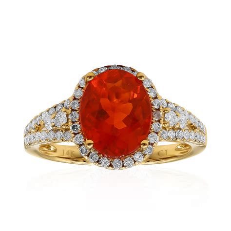 Anello nuziale con opale di fuoco e diamanti