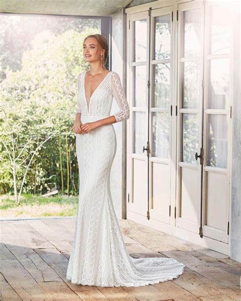 Illustrazione di un abito da sposa con maniche a tre quarti in pizzo