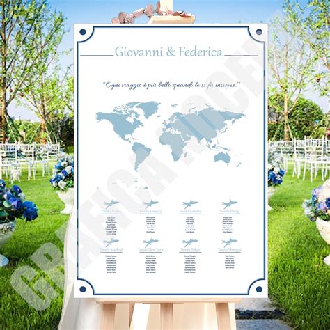 Dettaglio di un tableau mariage a tema viaggio con cornici portafoto