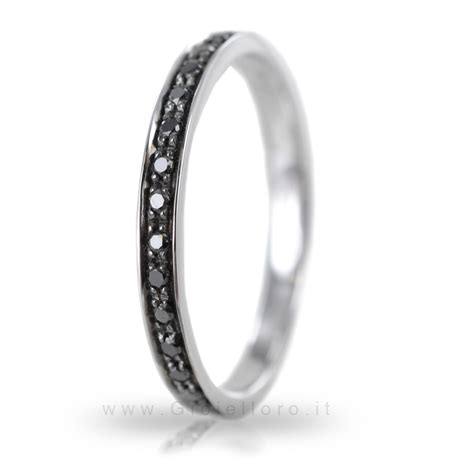 Anello nuziale in oro nero da uomo con inserti in oro