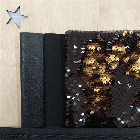 Pochette di stoffa con paillettes reversibili