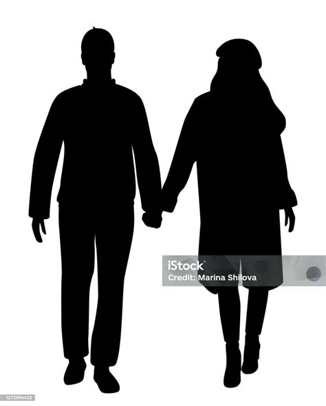 Uomo e donna che si tengono per mano in un ufficio anagrafe