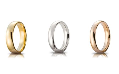 Diversi modelli di fedi nuziali in oro e platino