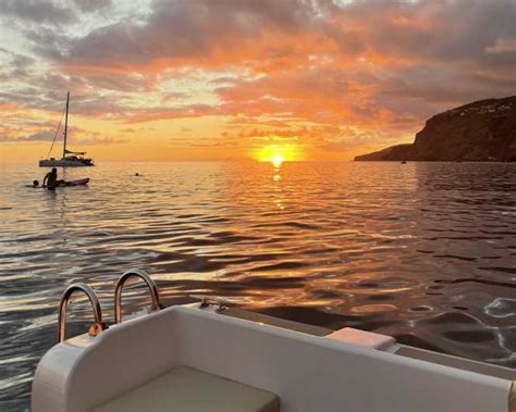 Barca privata al tramonto con ostriche