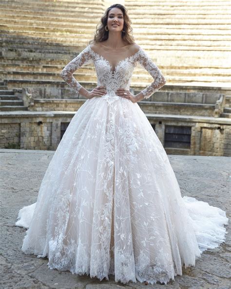 Vestito da sposa vintage con pizzo e maniche lunghe