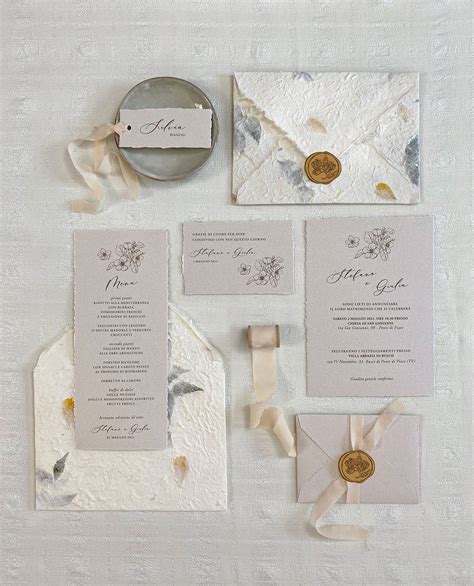 Coordinato grafico per matrimonio: ventagli e segnaposto